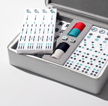 Travel mahjong set open in its case